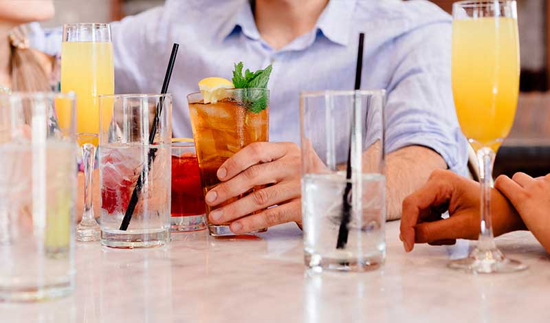 People enjoyinf drinks at restaurant